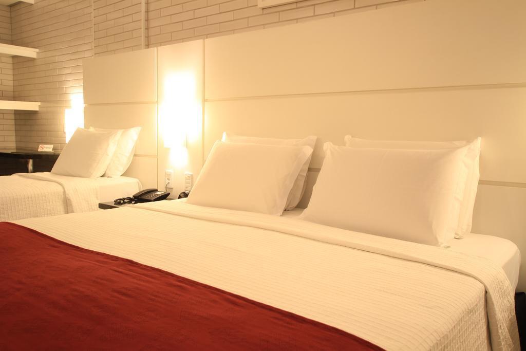 Hotel Confiance Prime Batel Курітіба Номер фото